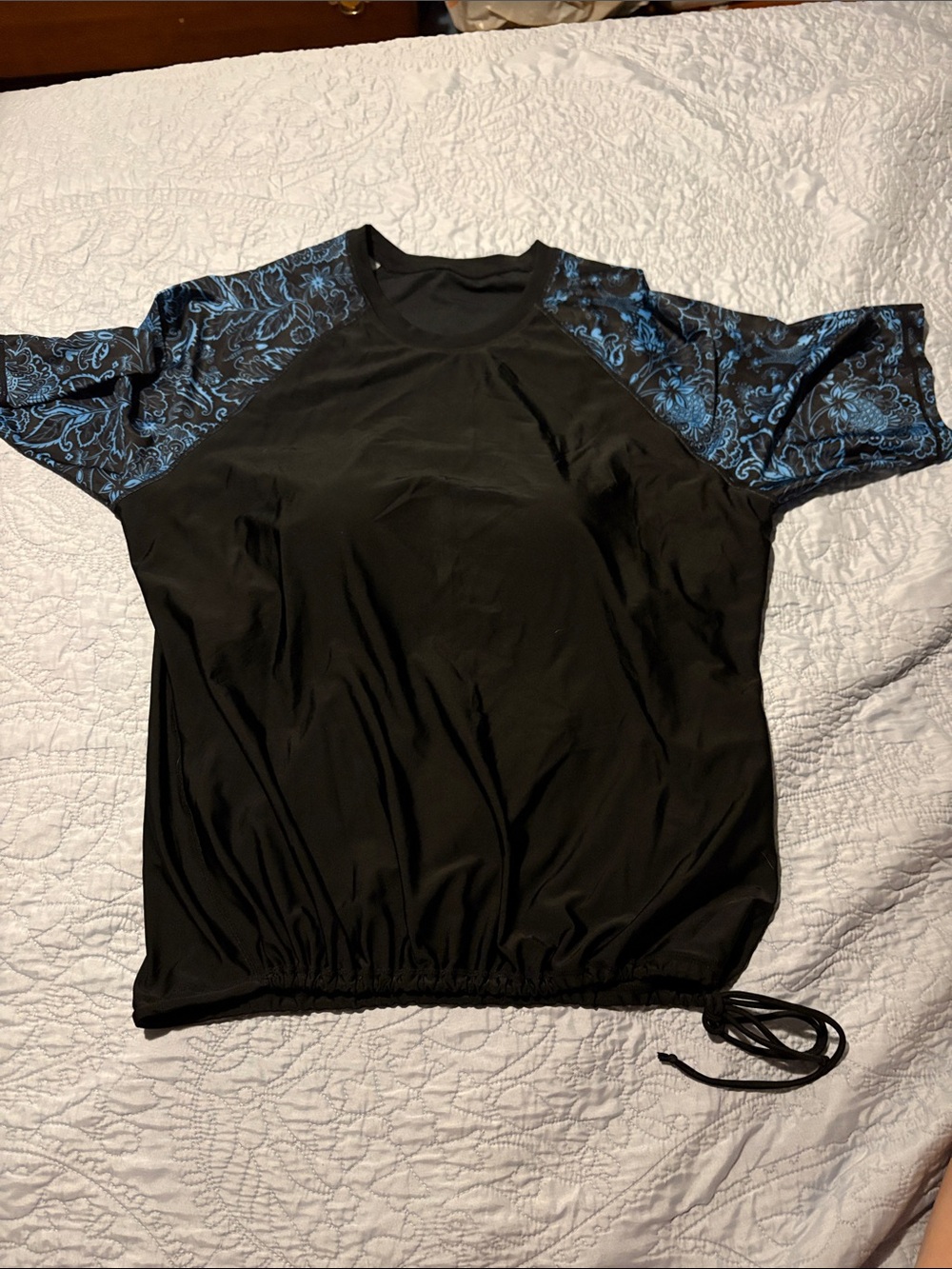 Like New Women’s Black Swim Top with Blue Floral Sleeves